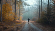A serene morning scene of a lone runner on a forest trail.