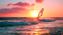 A Windsurfer Gliding Over The Ocean Waves At Sunset.