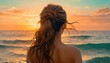  the back of a woman's head as she stands in front of a body of water with the sun setting in the back of the ocean behind her head.
