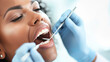 © Anoo - Woman Getting Teeth Checked by Dentist