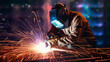 © Tony A - welder is welding metal , industry them bokeh and sparkle background