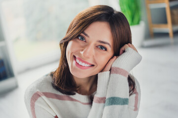 Poster - Photo of gorgeous peaceful person hands touch head beaming smile daydreaming pastime apartment inside