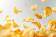 © Artem - Crispy and crunchy potato chips flying in the air against a plain white background