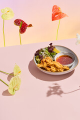 Wall Mural - Surrealistic Tempura Chicken Strips with Sweet Chili Sauce in a Colorful Floral Setting.