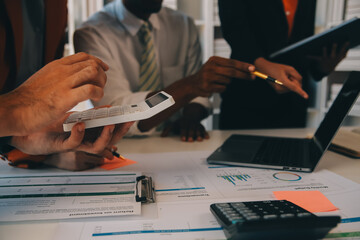 Co working conference, Business team meeting present, investor colleagues discussing new plan financial graph data on office table with laptop and digital tablet, Finance, accounting, investment.