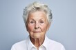 Portrait of a glad elderly woman in her 90s wearing a breathable golf polo against a plain white digital canvas. AI Generation