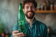 © LotusBlanc - Eco-Friendly Lifestyle: Man Holding a Recyclable Glass Bottle, Promoting Sustainable Living and Eco-Awareness Habbits.