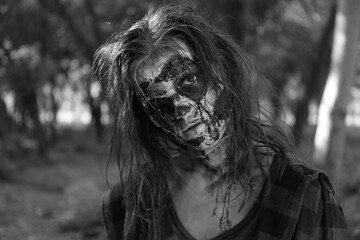 Wall Mural - Scary zombie outdoors, black and white effect. Halloween monster