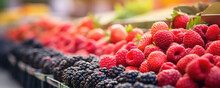 Market With Fresh Berries Like Strawberrie, Blueberries, Raspberies. Fruit On Table.