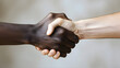 © Massimo Todaro - United in Strength: A Handshake Symbolizing No Racism