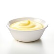 Delicious vanilla custard in a bowl isolated on white background, Tasty vanilla pudding in ramekin and flower
