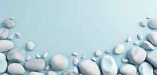 Assorted Pebbles Lined Up Against A Light Blue Gradient Background, Peaceful And Calming.