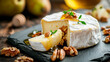 Camembert with honey and nuts. Selective focus.