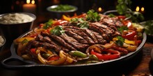 Sizzling Fajita Fiesta: Grilled Perfection Unleashed. Tender Strips Of Meat, Colorful Peppers, Onions â€“ A Flavorful Culinary Celebration 