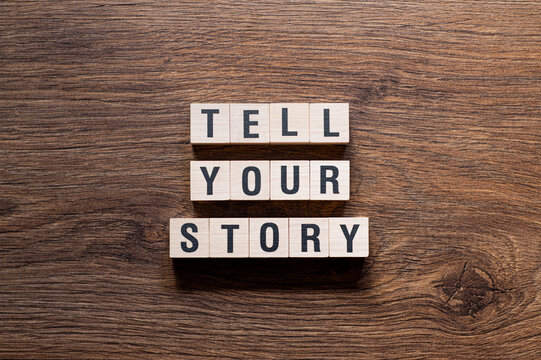 Tell your story - word concept on building blocks, text