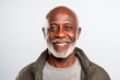 Portrait of an African-American man in his 60s dressed casually smiling and looking at the camera. Isolated, white background. Generative AI