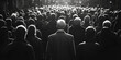 © ASSIASIA - A black and white photo capturing a large crowd of people. This versatile image can be used to depict various concepts and scenarios