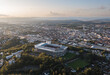 © uslatar - Aerial panoramic skyline cityscape of Kaiserslautern city and Fritz-Walter-Stadion, 1. FC Kaiserslautern stadium at sunset. Rhineland-palatinate, Germany