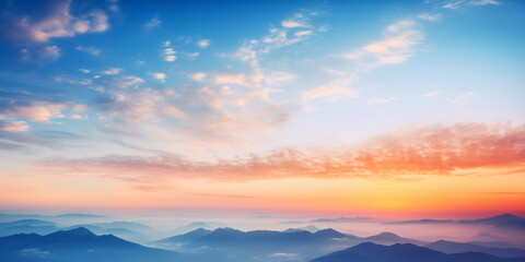 Wall Mural - Abstract gradient sunrise in the sky with cloud and blue mix orange natural background.