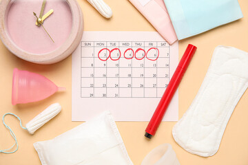 Wall Mural - Composition with menstrual calendar, alarm clock and different feminine hygiene products on color background