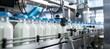 State of art machinery expertly filling milk into plastic bottles at dairy plant