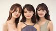 © LANGSSI - Harmonious Trio: Portrait of Three Young Women with Radiant Smiles
