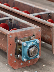 Wall Mural - Ball bearing on screw conveyor at a workshop