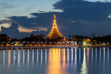 Nighttime View Of Wat Phra Mahathat Kaen Nakhon, Wat Nong Waeng, In Khon Ka  Thailand, Showcasing Its Ancient Thai Architecture, Golden Pagoda, And Cultural Significance Amidst The City Lights