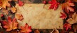 Maple leaves and invitation card, autumn wedding, top view, text space