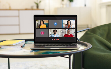 Aufkleber - Laptop with video call screen on table at home interior