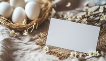 Mockup For A Greeting Card. Blank Greeting Card On A Table With Flowers. Colorful Easter Eggs And Spring Flowers On Easter Festive Background. Happy Easter! Empty Greeting Card, Postcard Or Banner.