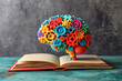 © Intelligent Horizons - Creative colorful brain and gears, on open book with education and success, Online education, creative mind, new idea, training, tutor, video lesson, course, knowledge and Collage school