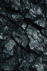 Poster - Close up view of a black rock wall. This image can be used for various purposes