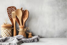 Kitchen Utensils On Table, Set Of Kitchen Utensils On Table Against Light Background With Space For Text