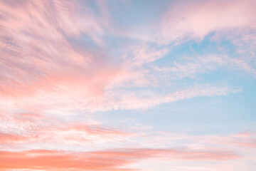 a beautiful sky tinted by the sun leaving vibrant shades of gold, pink, blue and multicolored. cloud