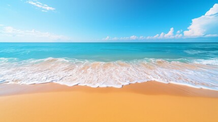 Wall Mural - Tranquil beach scene with golden sand, blue ocean, clear sky, and a large area for text background