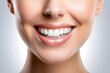 © D - close up of a person smiling.