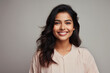 Portrait of a smiling young woman of Indian ethnicity
