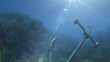 anchor under water sun ray illustration