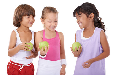 Laughing, apple or happy kids with nutrition, wellness or healthy diet in studio isolated on white background. Funny, fibre or group of a young children with natural fruits for vitamin c with smile