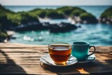 Fototapeta  - cup of tea on the beach