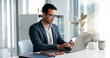 © Clement C/peopleimages.com - Data analysis, research and businessman with a tablet and laptop for accounting or economy growth. Office, Asian and financial worker with technology for email, planning or information on a website