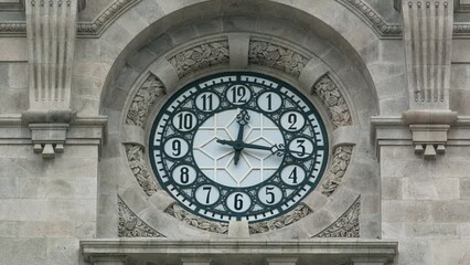 Wall Mural - Watch on City Hall building timelapse Camara Municipal do Porto on Liberdade Square, Porto, Portugal. Close up vie to watchface showing time