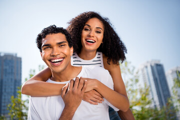 Canvas Print - Photo of excited charming wife husband wear casual clothes having fun together outside urban city street