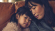 Closeup of a happy asian mother and daughter cuddling on the sofa, ai generated