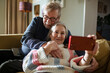 © Marko Geber - Happy smiling senior couple taking selfie at home