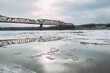 Railroad trestle bridge over icy Mississippi River