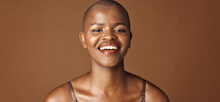Face, Beauty And Smile With Happy Black Woman In Studio Isolated On Brown Background For Wellness. Portrait, Skincare And Aesthetic For Foundation Cosmetics Or Dermatology With A Natural Bald Person