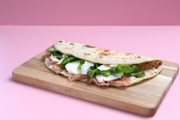 Wall Mural - Italian cuisine , Piadina with Italian ham and cheese