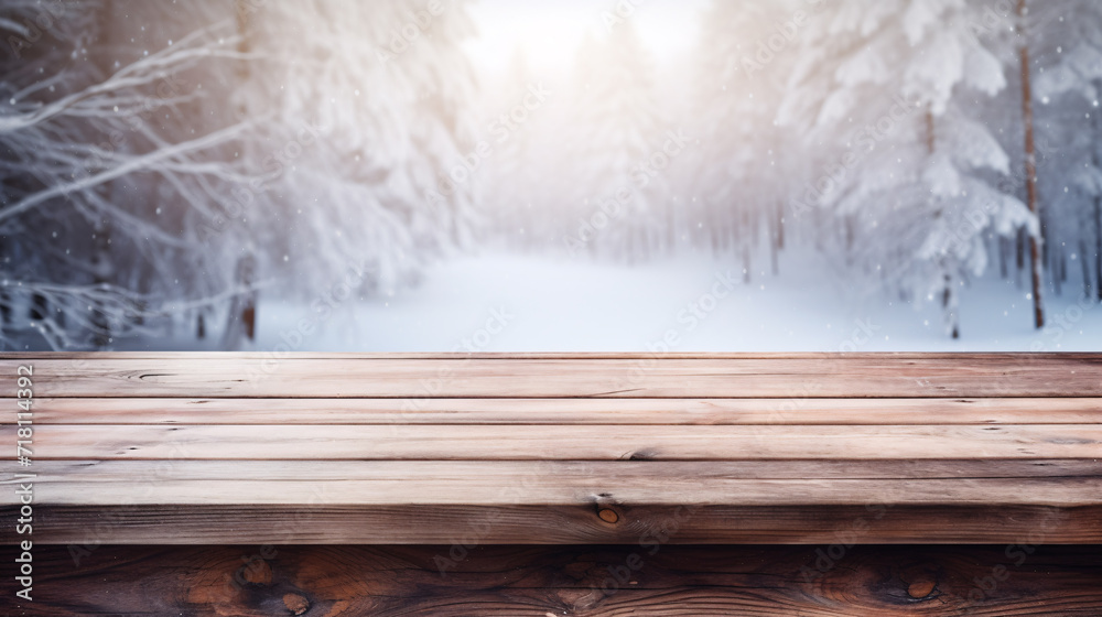 Amidst a winter snow landscape, an empty rustic wooden table, dusted ...